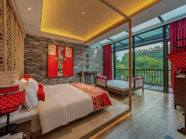 Shenzhen OCT Gankeng Ancient Town Phoenix Hakka Hotel : photo 2 de la chambre suite deluxe