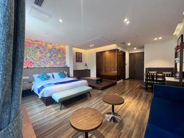 Overseas Chinese Town Nanyang Inn : photo 1 de la chambre chambre lit king-size exécutive