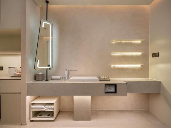 Hilton Garden Inn Nanjing Hexi Olympic Sports Center : photo 4 de la chambre chambre lit king-size premium avec canapé-lit