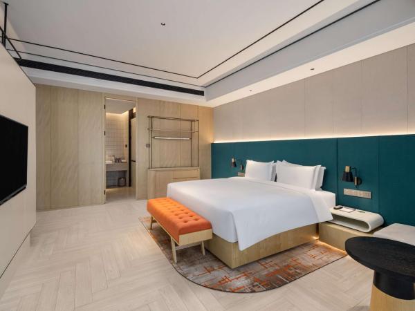 Hilton Garden Inn Nanjing Hexi Olympic Sports Center : photo 3 de la chambre suite deluxe avec lit king-size