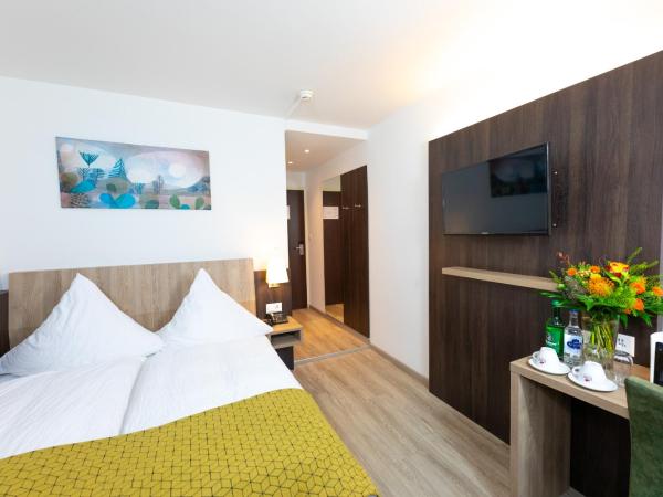 Hotel Alfa : photo 2 de la chambre chambre lit queen-size moderne 