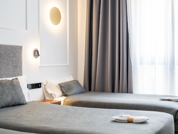 Hotel Conqueridor : photo 5 de la chambre chambre triple