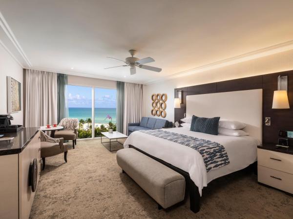 The Palms Hotel & Spa : photo 1 de la chambre hébergement deluxe avec 1 lit king-size et canapé-lit - côté océan