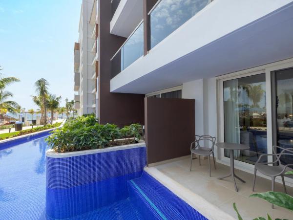 Royalton Splash Riviera Cancun, An Autograph Collection All-Inclusive Resort : photo 10 de la chambre suite junior de luxe baignade