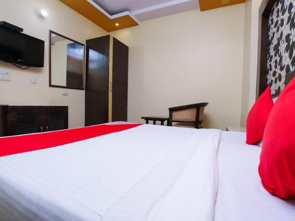 Super OYO Hotel J P Inn Near Patel Nagar Metro Station : photo 3 de la chambre chambre triple classique