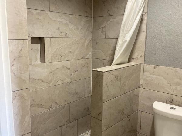 Island Suites Hobby Airport : photo 1 de la chambre suite lit king-size