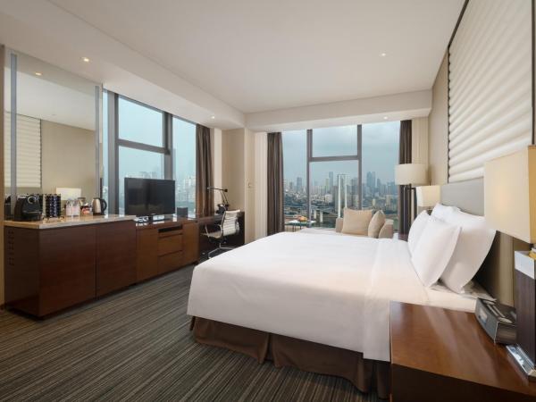 Radisson Blu Plaza Chongqing : photo 1 de la chambre executive room with yangtze river view