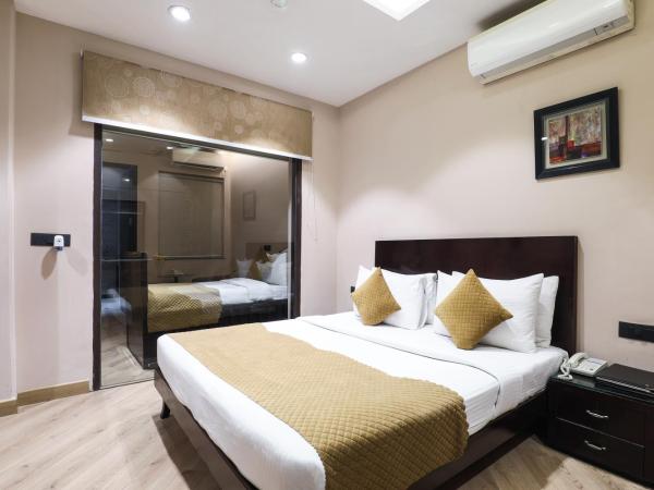 Cosy Grand, Near Chanakyapuri, Embassy Area : photo 3 de la chambre suite