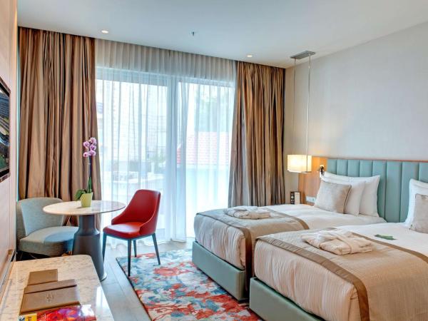 Rixos Premium Dubrovnik : photo 1 de la chambre chambre lits jumeaux standard avec vue sur le parc