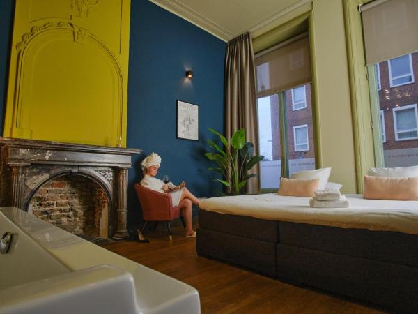 Hotel Corps de Garde : photo 9 de la chambre chambre double deluxe avec baignoire