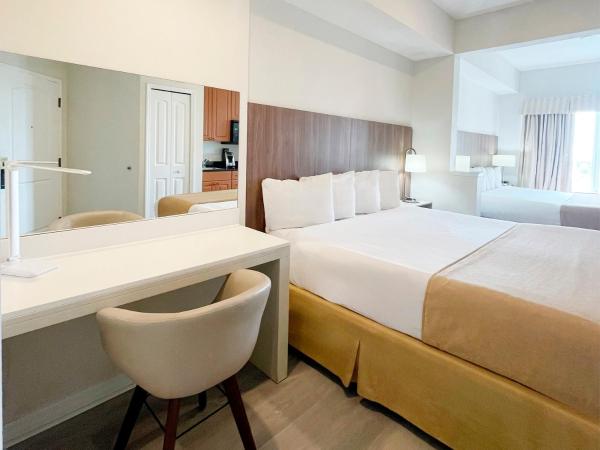 The Point Hotel & Suites Universal : photo 2 de la chambre chambre 2 lits king-size
