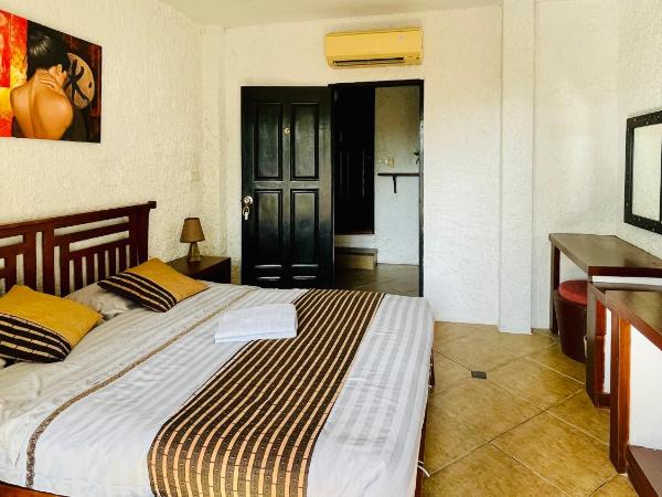 Sojourn 6 bedroom villa near Full Moon Beach : photo 3 de la chambre chambre quadruple Économique avec salle de bains commune