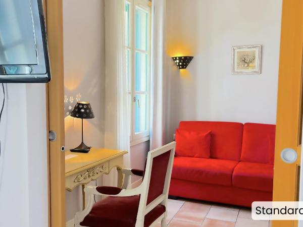 Hôtel l'Arena : photo 1 de la chambre chambre familiale standard