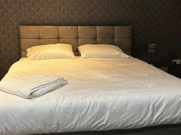 The Pleasant House : photo 1 de la chambre chambre triple avec salle de bains commune