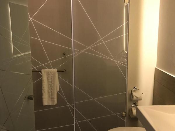 City Express Plus by Marriott Merida : photo 1 de la chambre chambre lit king-size