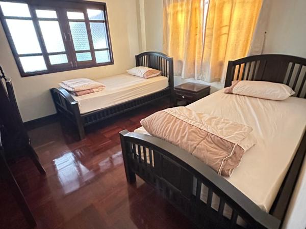 SJ House : photo 4 de la chambre chambre lits jumeaux standard avec vue sur jardin