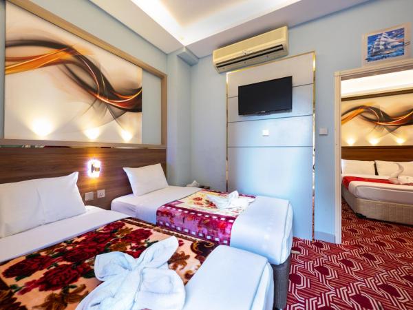 Tanha Hotel : photo 8 de la chambre chambre familiale