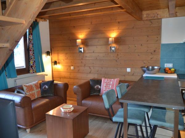 Hôtel et Chalet Au Coin Du Feu Chilly Powder : photo 4 de la chambre appartement en duplex