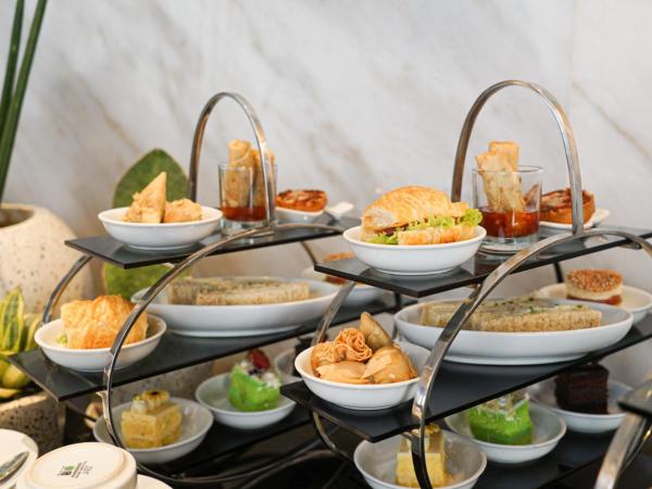 Grand Swiss-Belhotel Darmo : photo 2 de la chambre business suite with daily afternoon tea