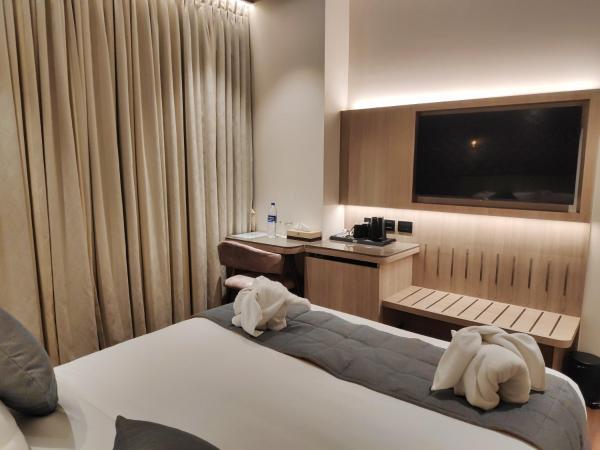 Maxxvalue Hotel MIDC - Andheri : photo 9 de la chambre chambre lit king-size deluxe