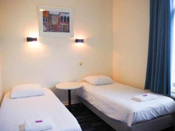 Euphemia Budget Old City Canal Zone : photo 4 de la chambre chambre triple avec salle de bains privative