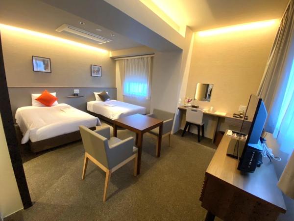 PORTA INN bentencho : photo 1 de la chambre chambre lits jumeaux deluxe