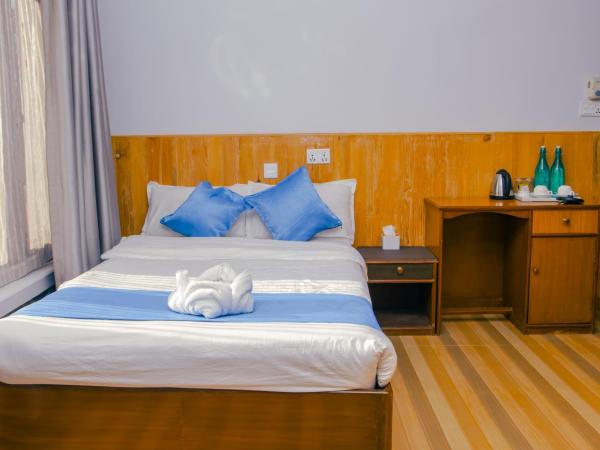 Roamers Inn - Hostel : photo 2 de la chambre chambre double supérieure