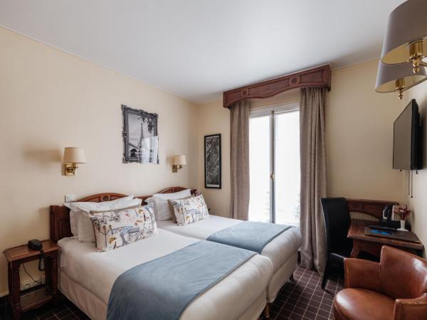 Hotel Minerve : photo 1 de la chambre petite chambre lits jumeaux