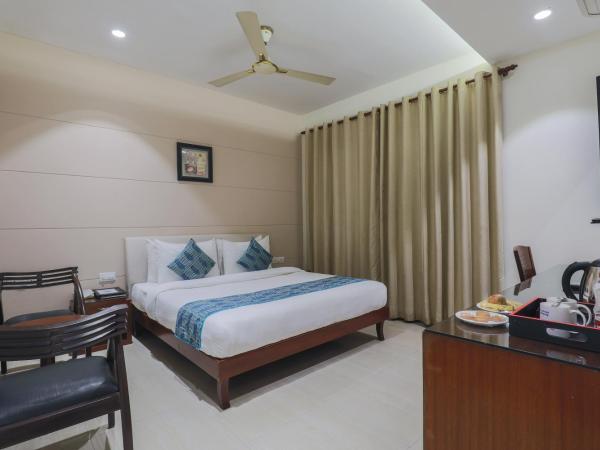 Cosy Grand, Near Chanakyapuri, Embassy Area : photo 1 de la chambre chambre deluxe double ou lits jumeaux