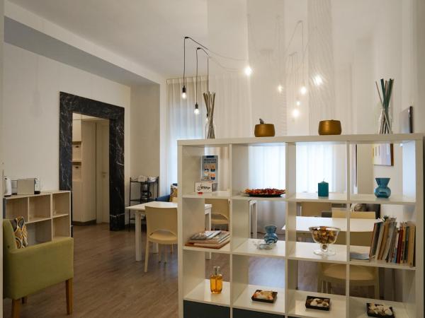 SalernoPrestige rooms : photo 3 de la chambre chambre triple deluxe