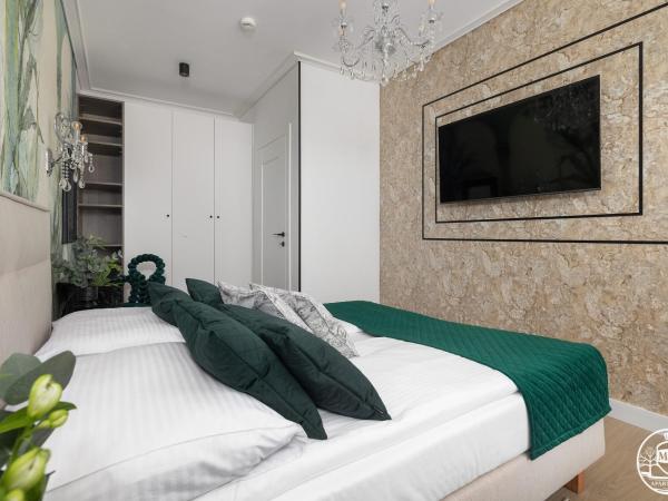 Polanki Aqua - Aquapark, Free Parking, Apartments M&M Kołobrzeg : photo 6 de la chambre deluxe apartment with air conditioninig and beach equipment