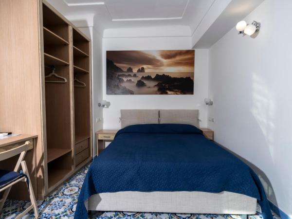 Guest House La Piazzetta : photo 9 de la chambre chambre double deluxe