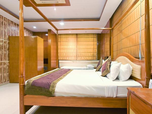 The Byke Grassfield Resort with Outdoor Pool, Shyam Nagar, Jaipur : photo 1 de la chambre suite lit king-size