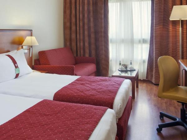 Holiday Inn Cagliari, an IHG Hotel : photo 6 de la chambre chambre lit king-size premium avec canapé-lit