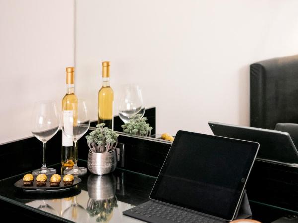 Principado Downtown : photo 9 de la chambre chambre junior avec 2 lits