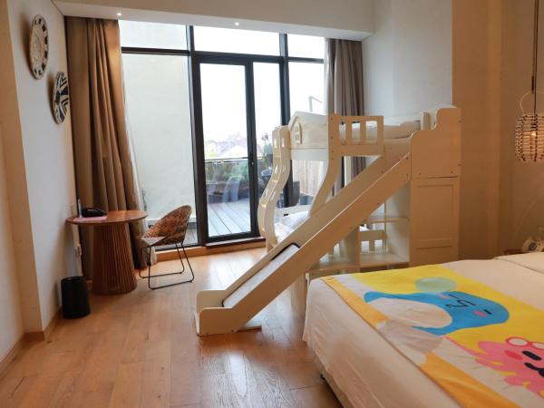 Shanghai Pudong Airport Moonlo Hotel - Pet Friendly : photo 4 de la chambre suite familiale deluxe