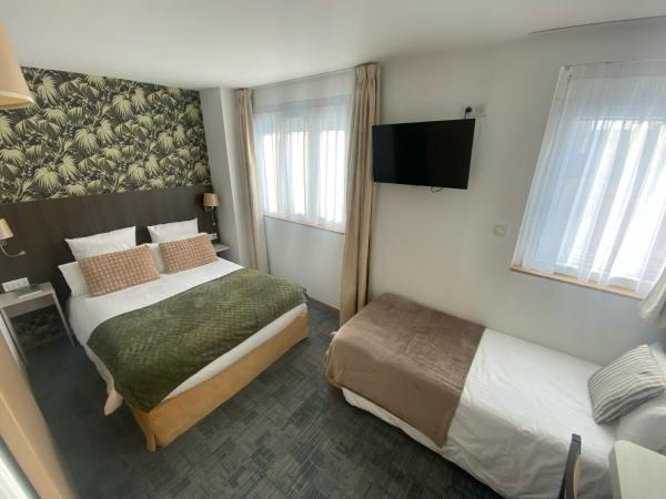 Cit'Hotel Hôtel de France et d'Europe : photo 5 de la chambre chambre triple (1 lit double et 1 lit simple)