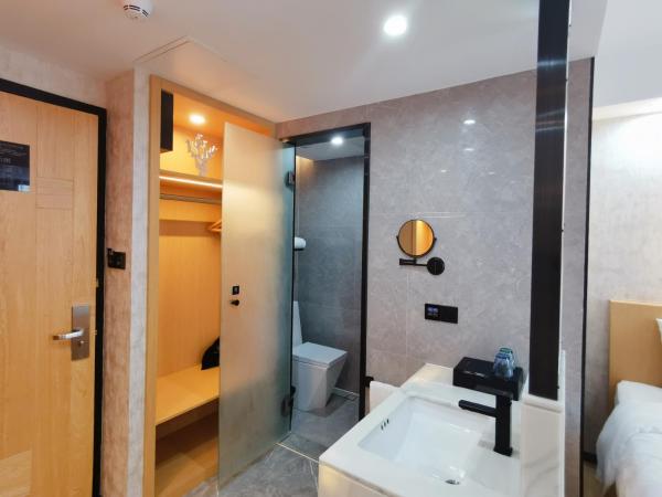 Connar Hotel - Shenzhen Futian : photo 9 de la chambre chambre lits jumeaux confort