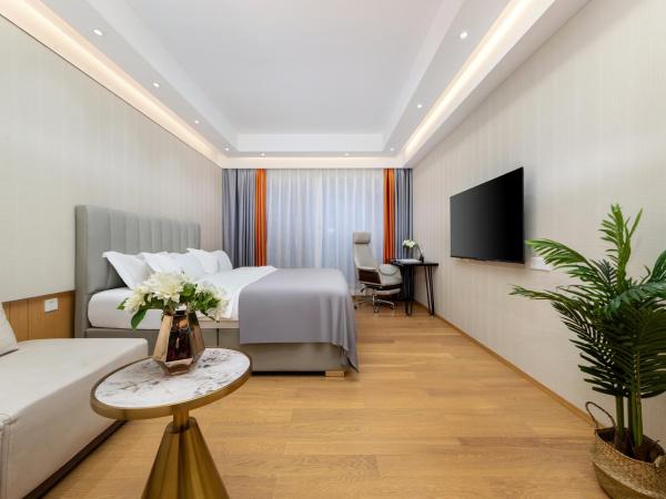 Doria Home International Apartment -Guangzhou Huijin IFC Keyun Road Metro Branch-Canton Fair Free Shuttle : photo 1 de la chambre chambre lit queen-size deluxe