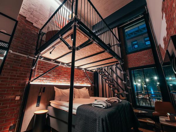 Clarion Hotel Mestari : photo 2 de la chambre loft avec 1 lit king-size