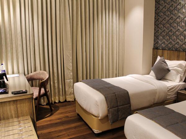 Maxxvalue Hotel MIDC - Andheri : photo 3 de la chambre chambre lits jumeaux deluxe