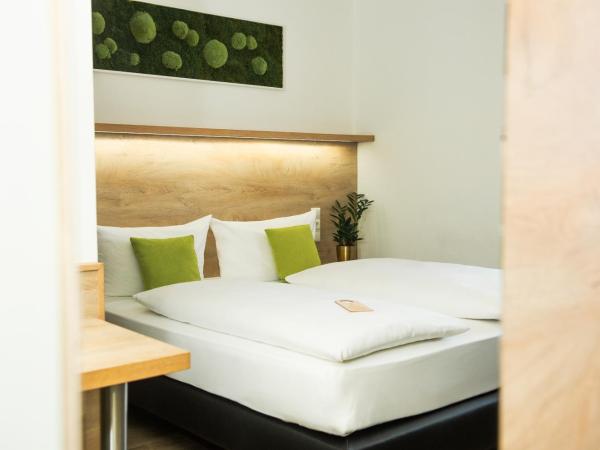 Hotel Perlach Allee by Blattl : photo 1 de la chambre chambre double lit queen size