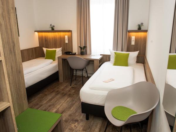 Hotel Perlach Allee by Blattl : photo 1 de la chambre chambre lits jumeaux