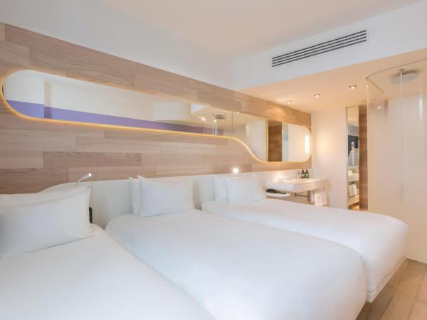 voco Milan-Fiere, an IHG Hotel : photo 7 de la chambre chambre lits jumeaux standard avec lit d'appoint
