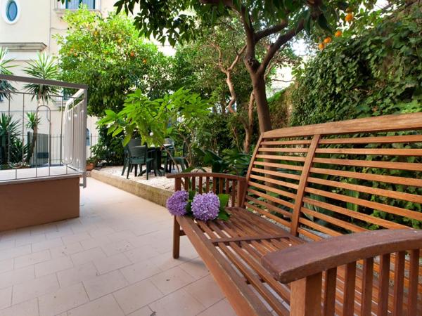 Hotel Regina : photo 6 de la chambre chambre quadruple avec jardin privé