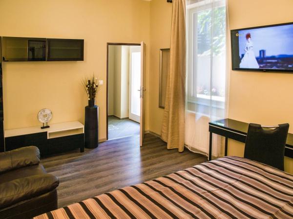 Dům U pikové desítky : photo 5 de la chambre chambre lit king-size