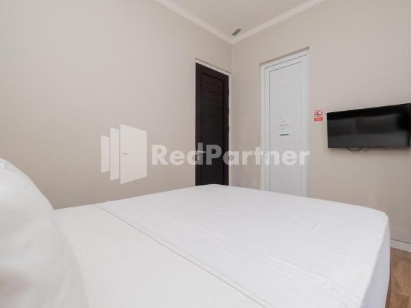 Palm Eight Mitra RedDoorz : photo 2 de la chambre chambre double deluxe