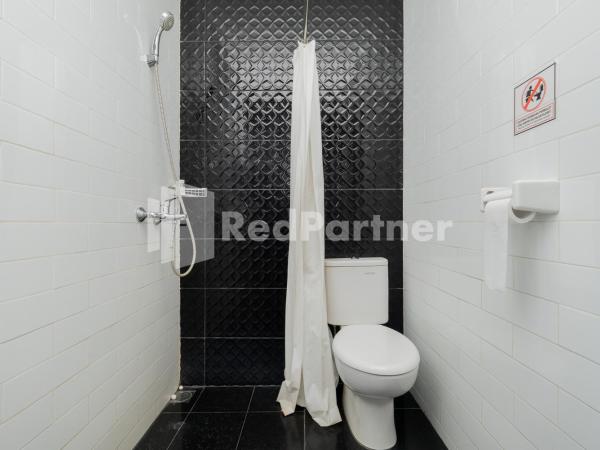 Palm Eight Mitra RedDoorz : photo 6 de la chambre chambre double deluxe