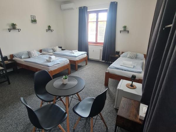 Penzion a Restaurace Simanda : photo 1 de la chambre chambre triple standard