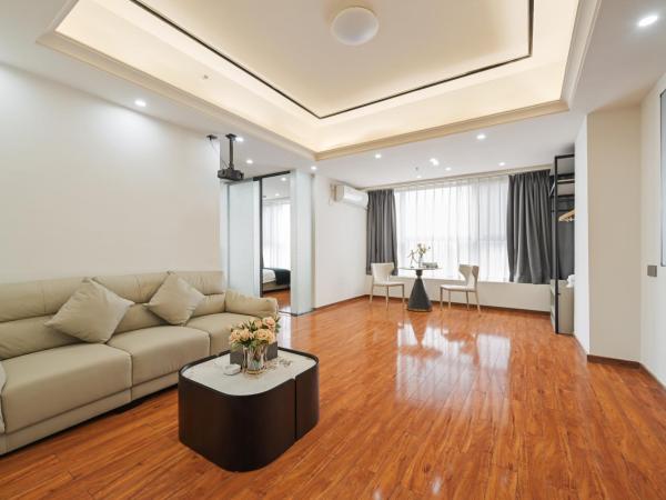 East Maple International Apartment - Guangzhou Luogang Wanda Plaza Suyuan Metro Station : photo 1 de la chambre appartement 2 chambres